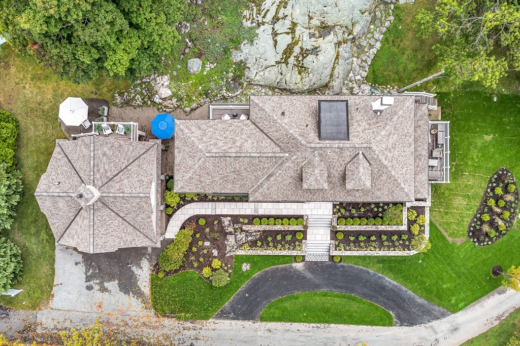 17 Atlantic Avenue, Unit MAIN HOUSE Cohasset, MA 02025 - Photo 3 of 22 a sign that is on the side of a building