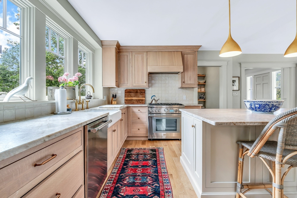 17 Atlantic Avenue, Unit MAIN HOUSE Cohasset, MA 02025 - Photo 5 of 22 a kitchen with a stove a sink and a refrigerator