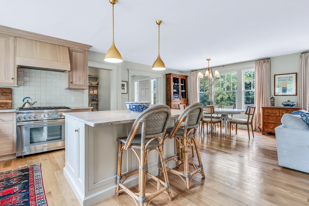17 Atlantic Avenue, Unit MAIN HOUSE Cohasset, MA 02025 - Photo 6 of 22 a dining room with furniture window wooden floor