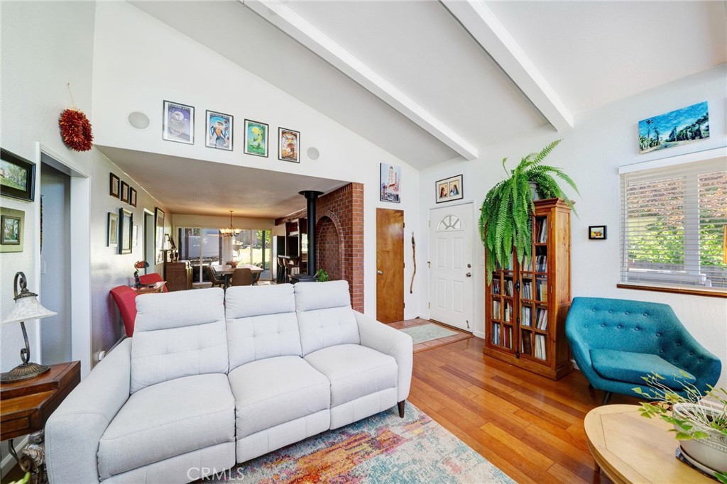 704 Old Meadow Valley Road Quincy, CA 95971 - Photo 12 of 38 a living room with furniture fireplace and a large window