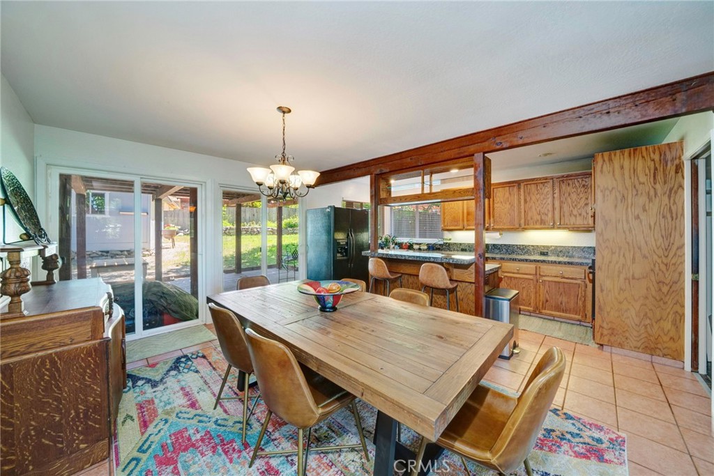 704 Old Meadow Valley Road Quincy, CA 95971 - Photo 14 of 38 a view of a dining room with furniture window and wooden floor
