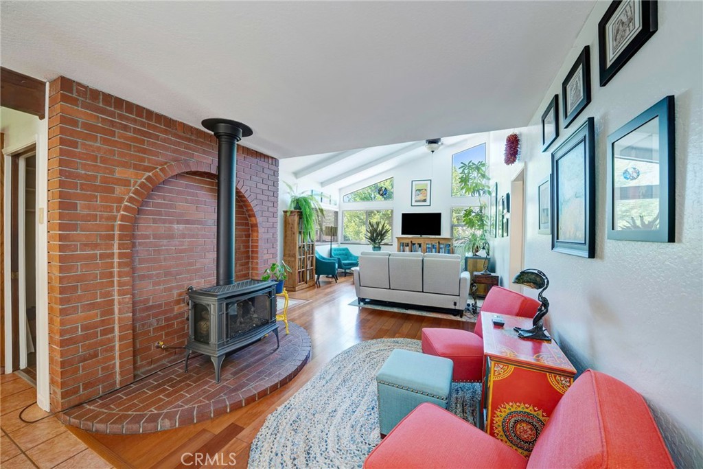 704 Old Meadow Valley Road Quincy, CA 95971 - Photo 16 of 38 a living room with furniture fireplace and flat screen tv