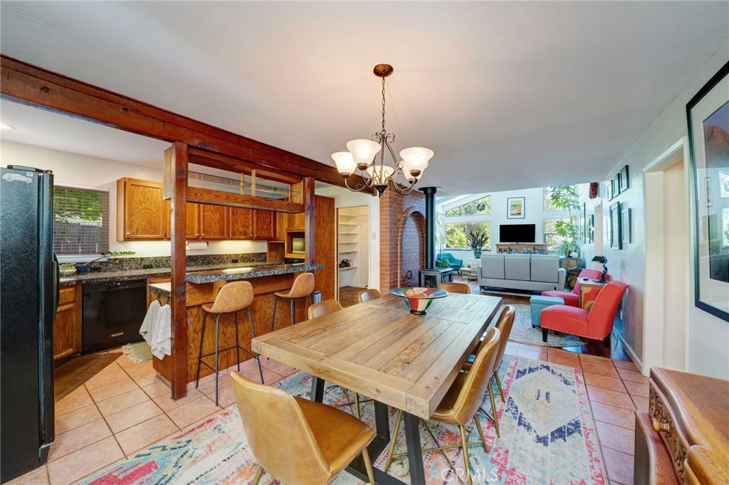 704 Old Meadow Valley Road Quincy, CA 95971 - Photo 17 of 38 a outdoor dining area with furniture and a chandelier
