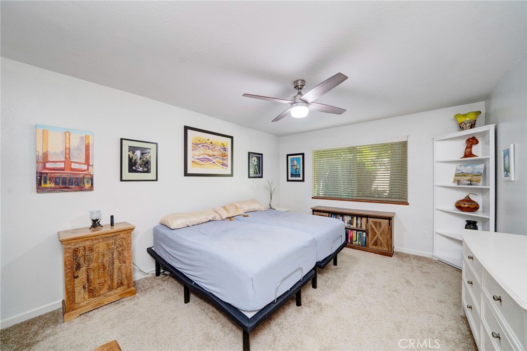 704 Old Meadow Valley Road Quincy, CA 95971 - Photo 18 of 38 a bedroom with a bed and a table in it