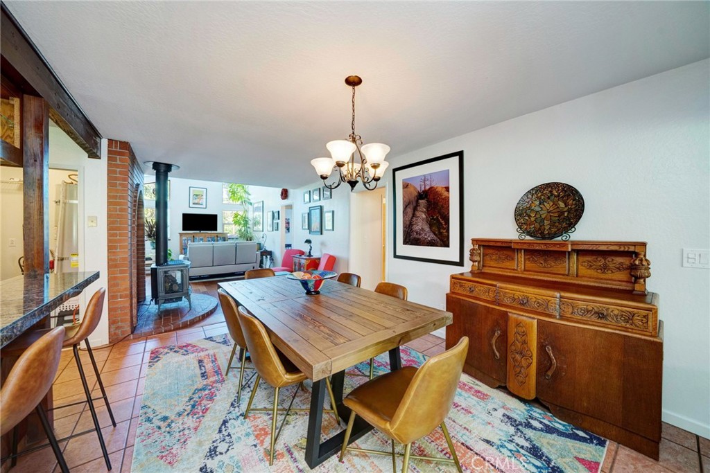 704 Old Meadow Valley Road Quincy, CA 95971 - Photo 21 of 38 a view of a dining room with furniture and chandelier