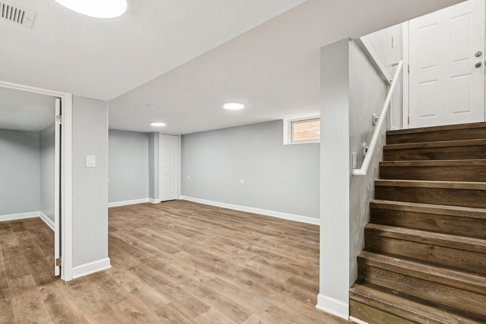 14230 South Normal Avenue Riverdale, IL 60827 - Photo 14 of 33 a view of an empty room with stairs