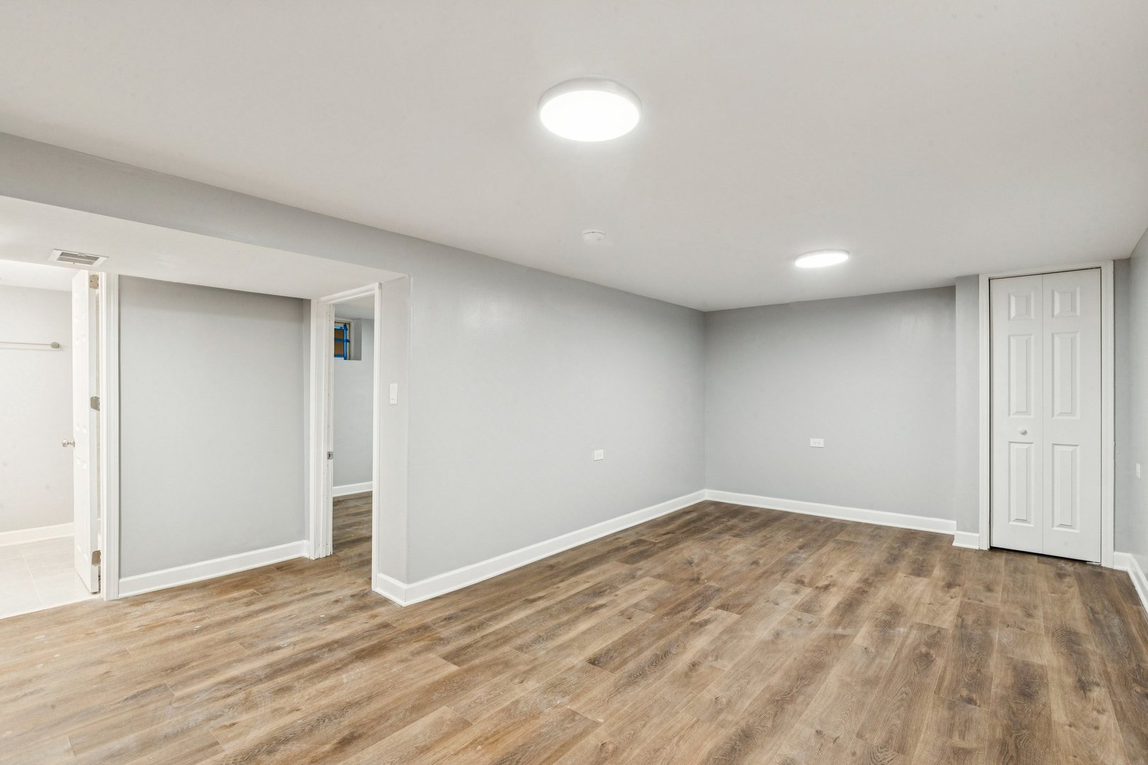 14230 South Normal Avenue Riverdale, IL 60827 - Photo 15 of 33 a view of an empty room with wooden floor