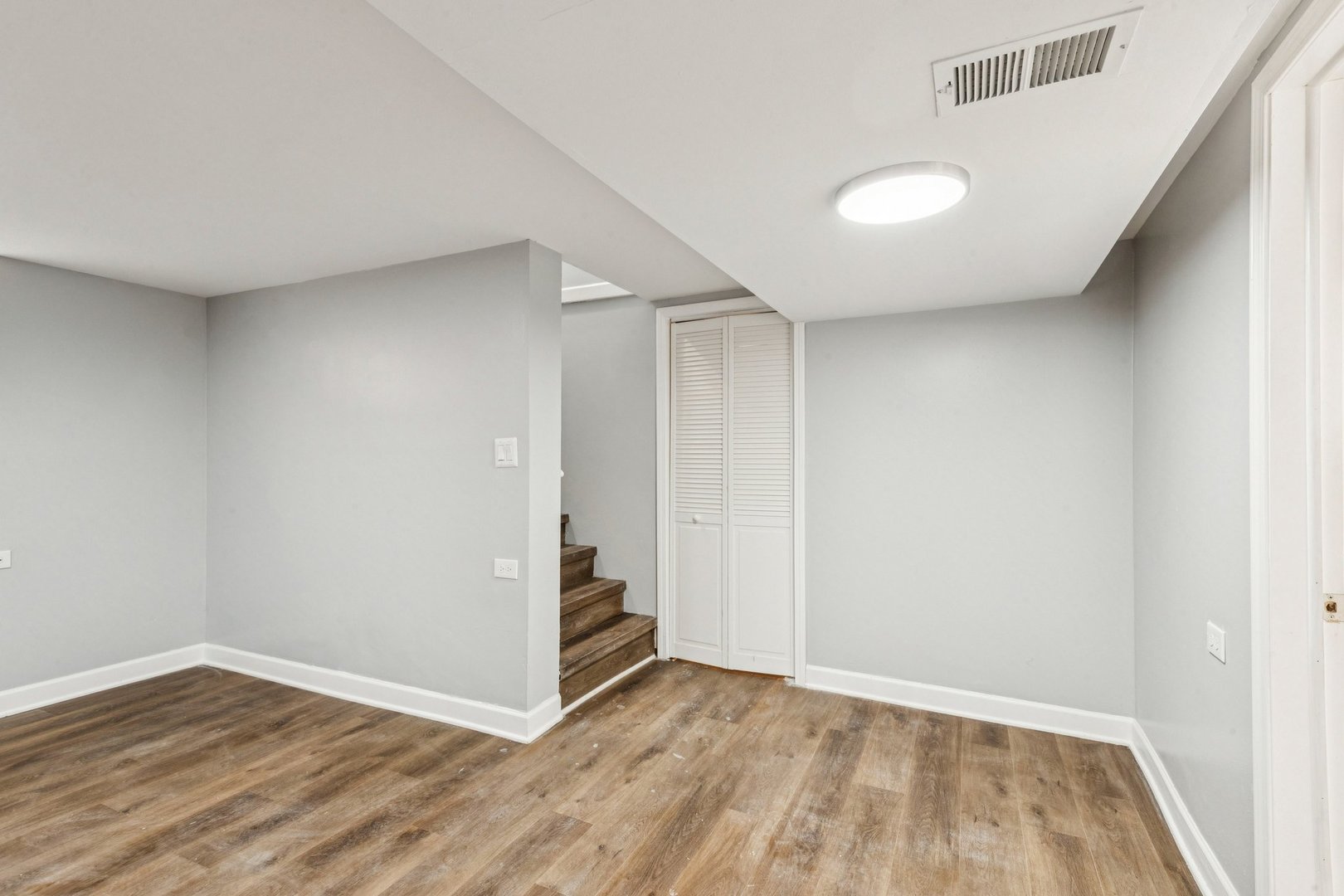14230 South Normal Avenue Riverdale, IL 60827 - Photo 16 of 33 wooden floor in an empty room