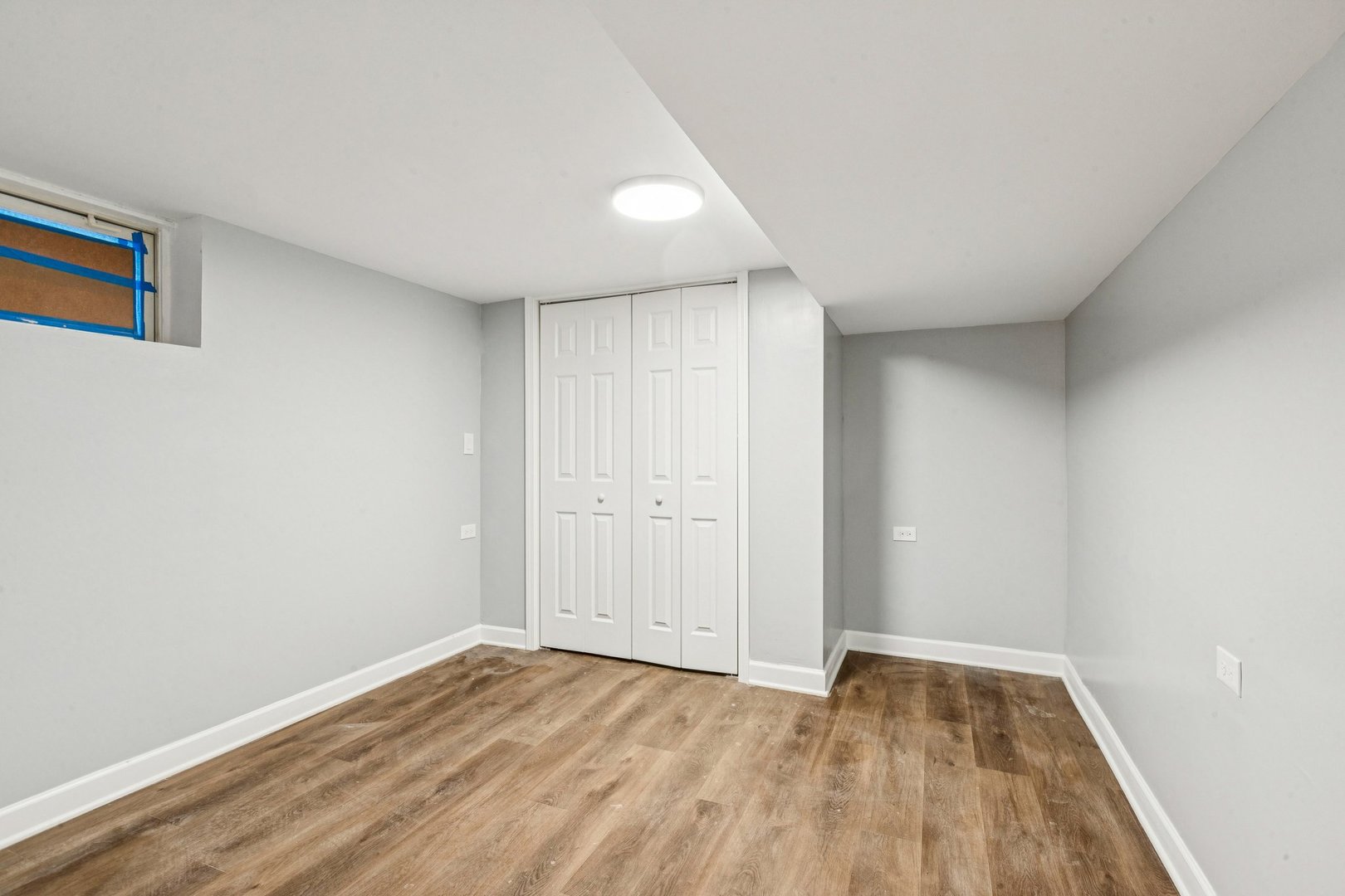 14230 South Normal Avenue Riverdale, IL 60827 - Photo 18 of 33 a view of an empty room with wooden floor and closet