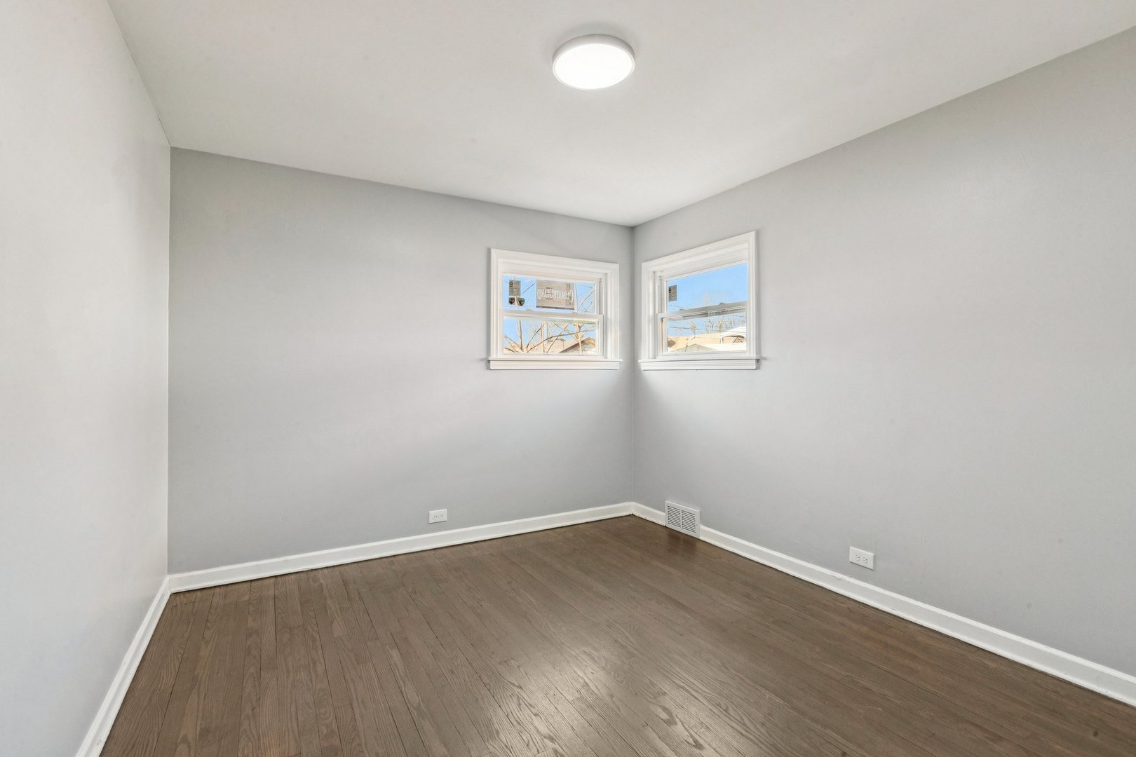 14230 South Normal Avenue Riverdale, IL 60827 - Photo 22 of 33 wooden floor in an empty room