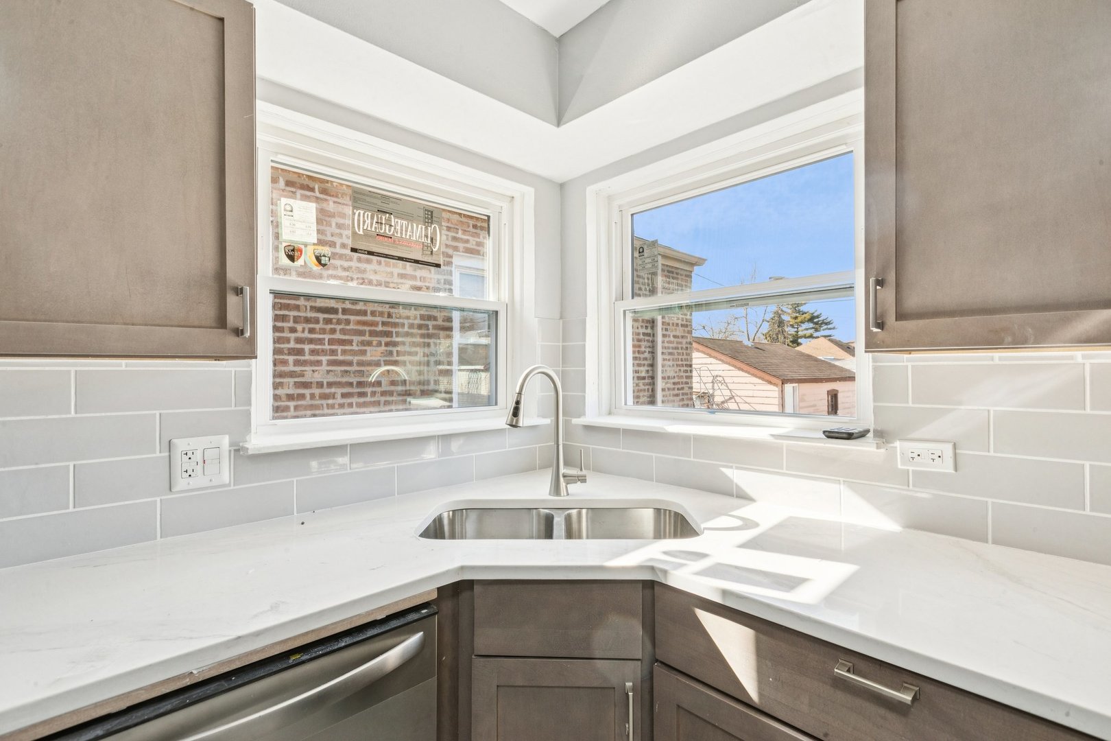 14230 South Normal Avenue Riverdale, IL 60827 - Photo 7 of 33 a kitchen with a sink and a window