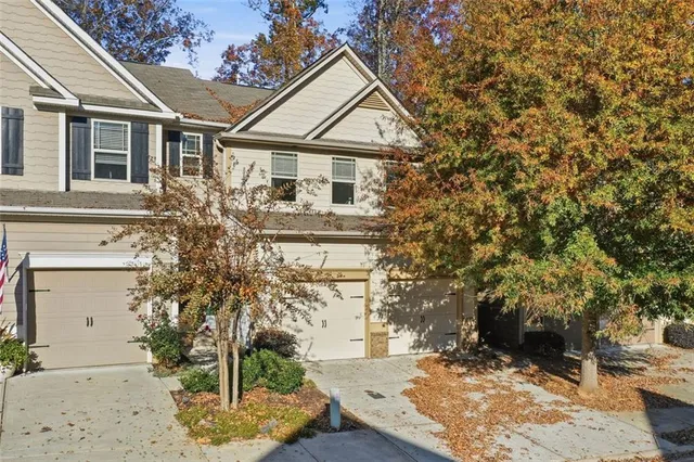 front view of a house with a yard