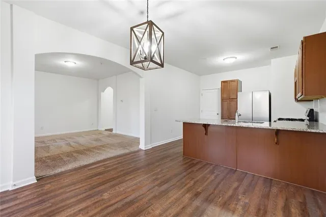 a view of kitchen and natural light