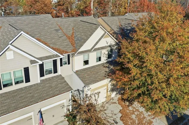 a view of house with yard