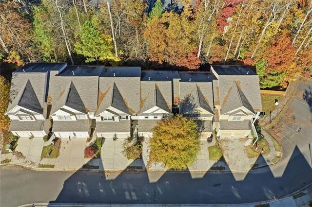 a view of wooden floor and a potted plant