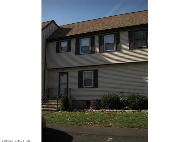 246 Reeds Gap Road East, Unit 3B North Branford, CT 06472 - Photo 1 of 1 a front view of a house with a yard