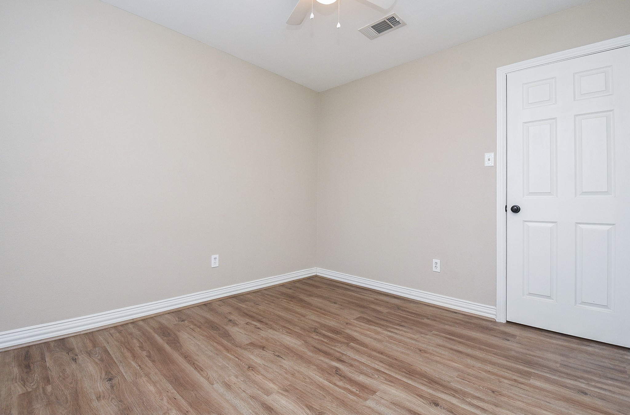 4606 Whispering Rock Lane Spring, TX 77388 - Photo 20 of 30 a view of an empty room with wooden floor