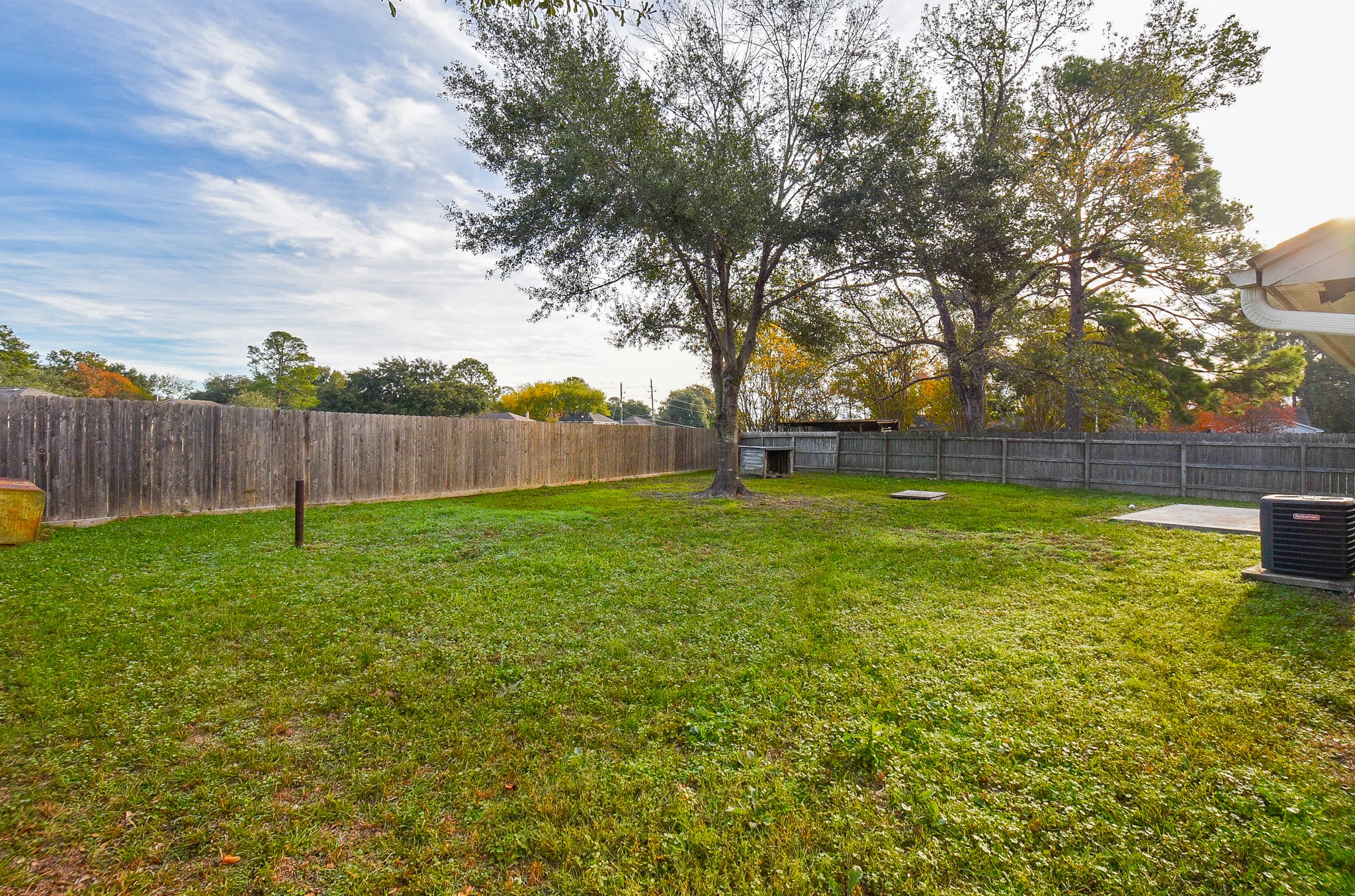 4606 Whispering Rock Lane Spring, TX 77388 - Photo 29 of 30 a view of yard with tree and wooden fence