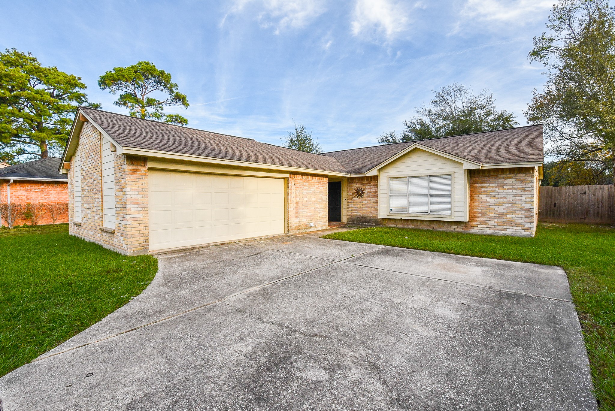 4606 Whispering Rock Lane Spring, TX 77388 - Photo 30 of 30 a view of a house with a yard and potted plants
