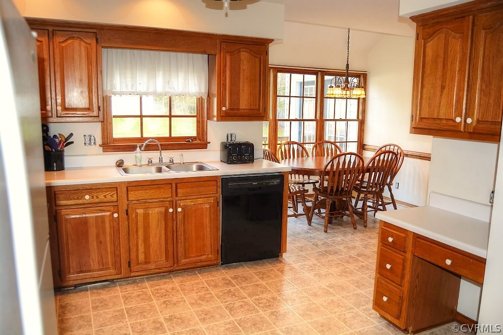 11715 Winterpock Road Chesterfield, VA 23838 - Photo 16 of 21 a kitchen with stainless steel appliances granite countertop sink stove and white cabinets