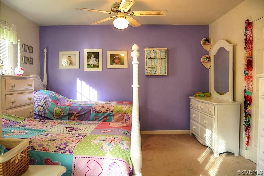 11715 Winterpock Road Chesterfield, VA 23838 - Photo 20 of 21 a bedroom with a bed and ceiling fan