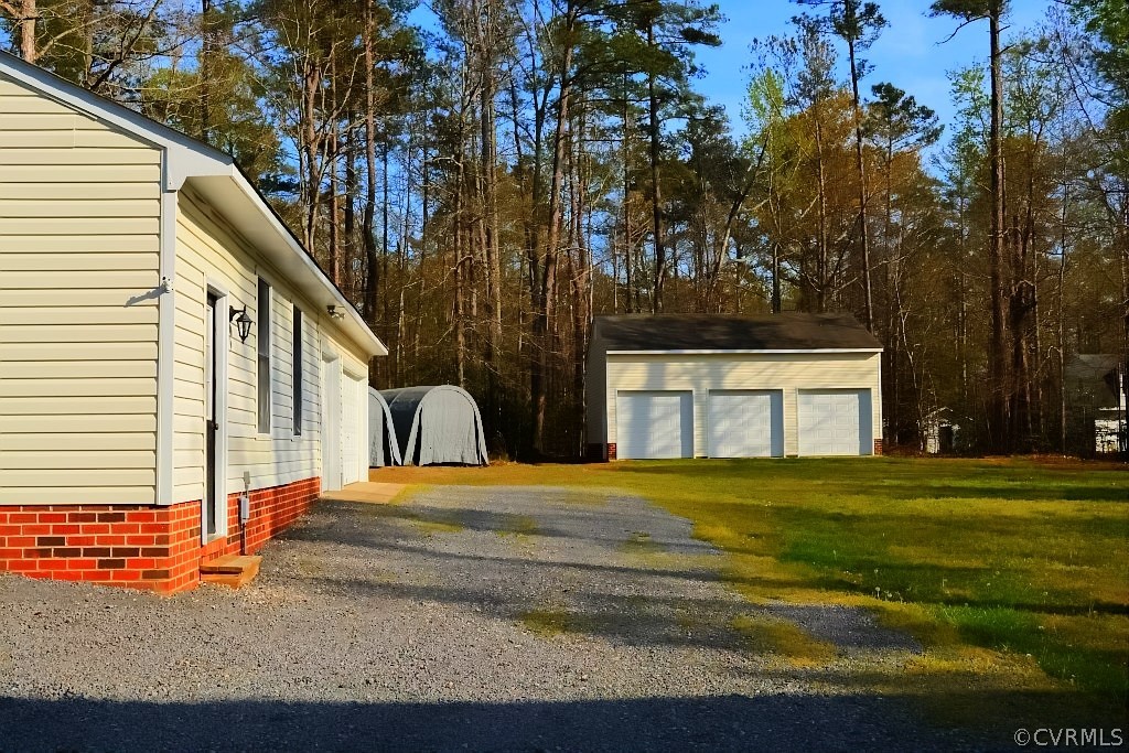 11715 Winterpock Road Chesterfield, VA 23838 - Photo 7 of 21 a front view of a house with a yard