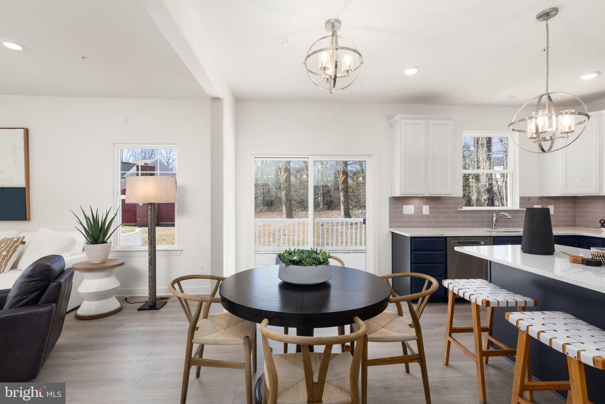 529 C Trimble Road Joppa, MD 21085 - Photo 15 of 26 a view of a dining room with furniture window and wooden floor