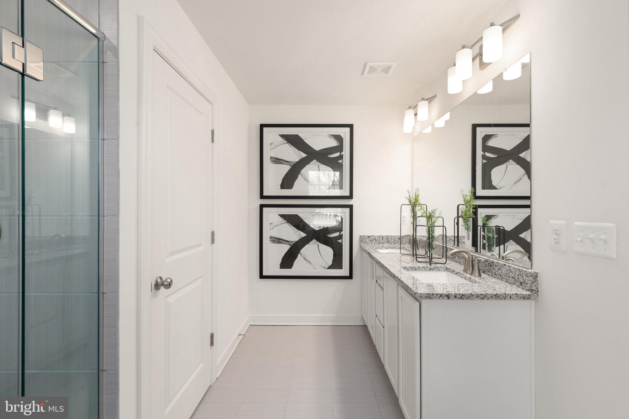 529 C Trimble Road Joppa, MD 21085 - Photo 21 of 26 a bathroom with a granite countertop sink mirror and vanity