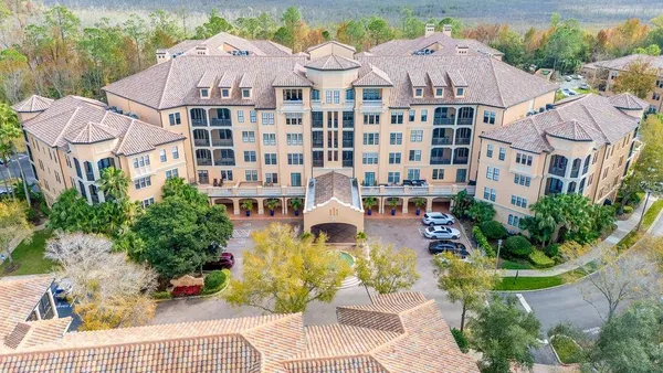 a front view of a multi story residential apartment buildings