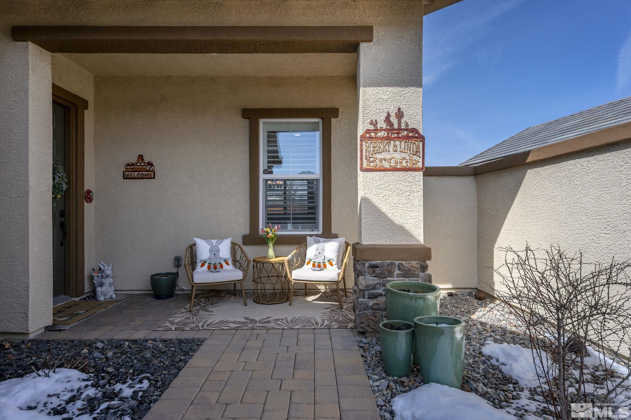 2215 Trakehner Lane Reno, NV 89521 - Photo 2 of 23 a living room with furniture and a window