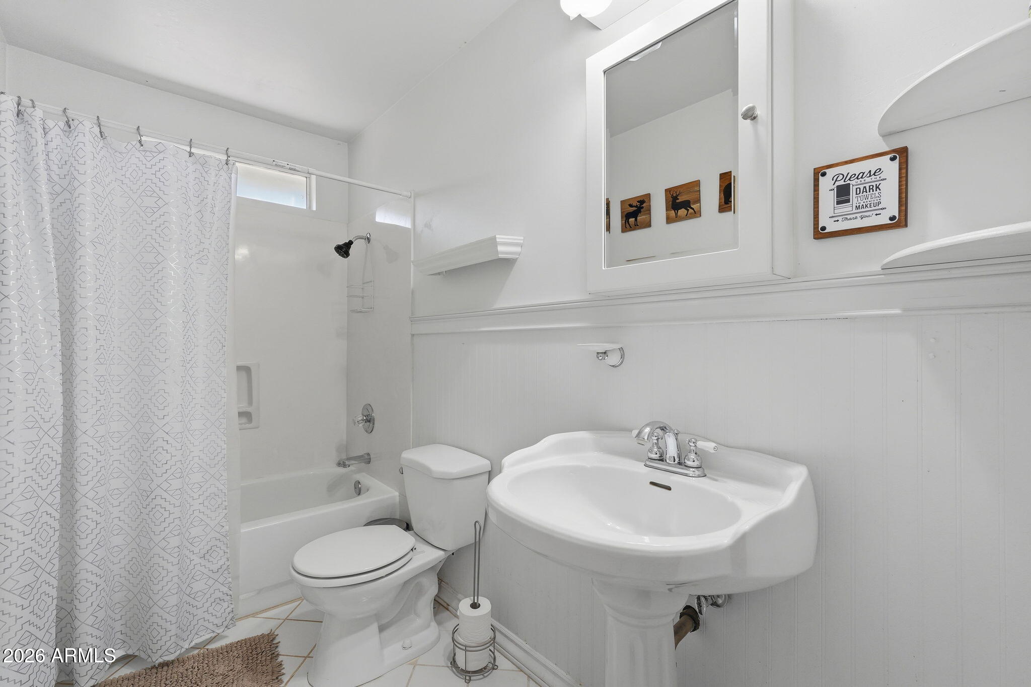 8247 Ralls Drive Pine, AZ 85544 - Photo 26 of 50 a bathroom with a sink toilet and shower