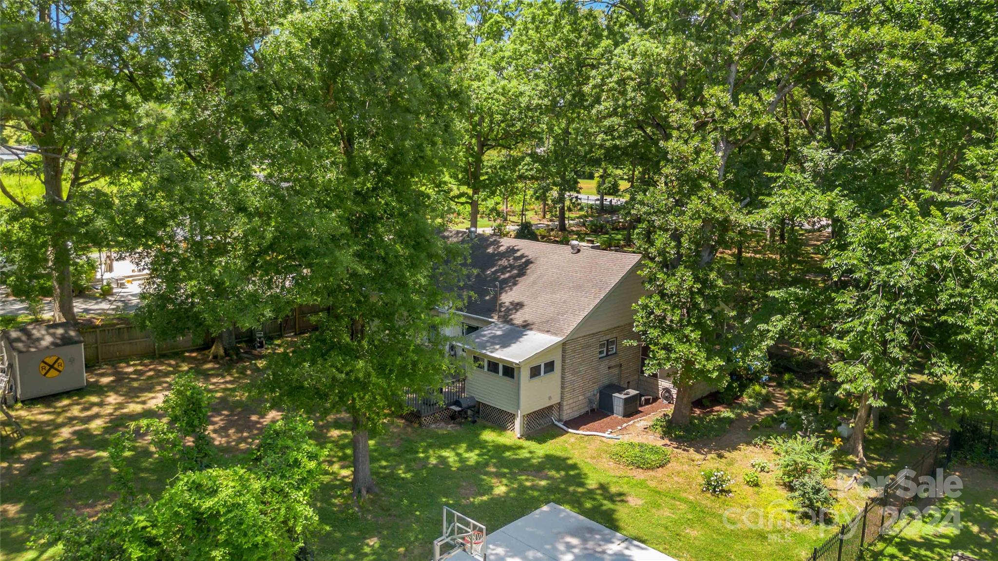 5500 Wilora Lake Road Charlotte, NC 28212 - Photo 26 of 32 a view of a house with a yard