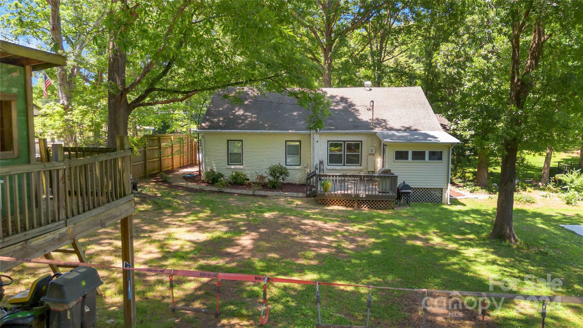 5500 Wilora Lake Road Charlotte, NC 28212 - Photo 28 of 32 a view of a house with backyard porch and sitting area