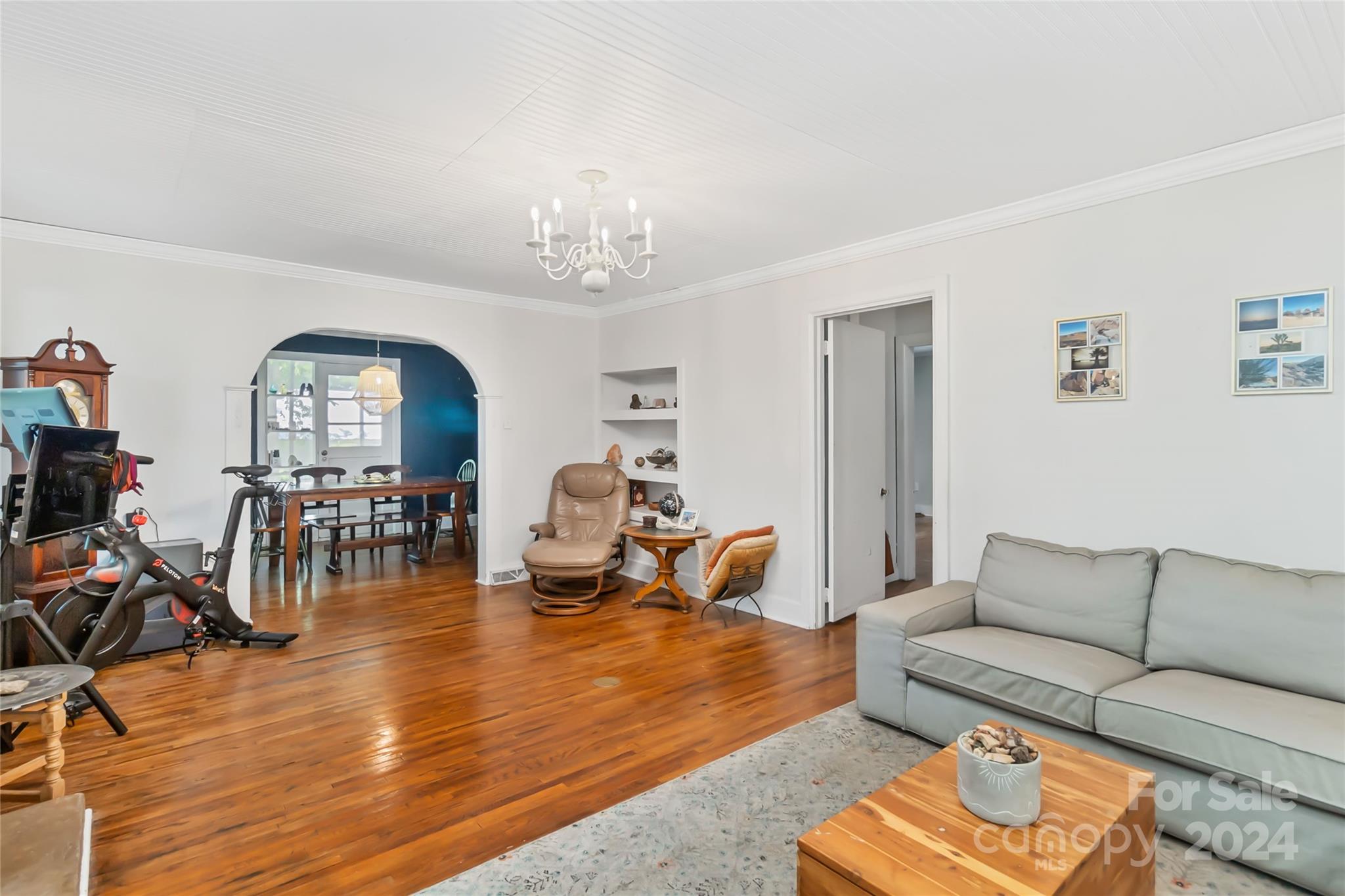5500 Wilora Lake Road Charlotte, NC 28212 - Photo 6 of 32 a living room with furniture and wooden floor