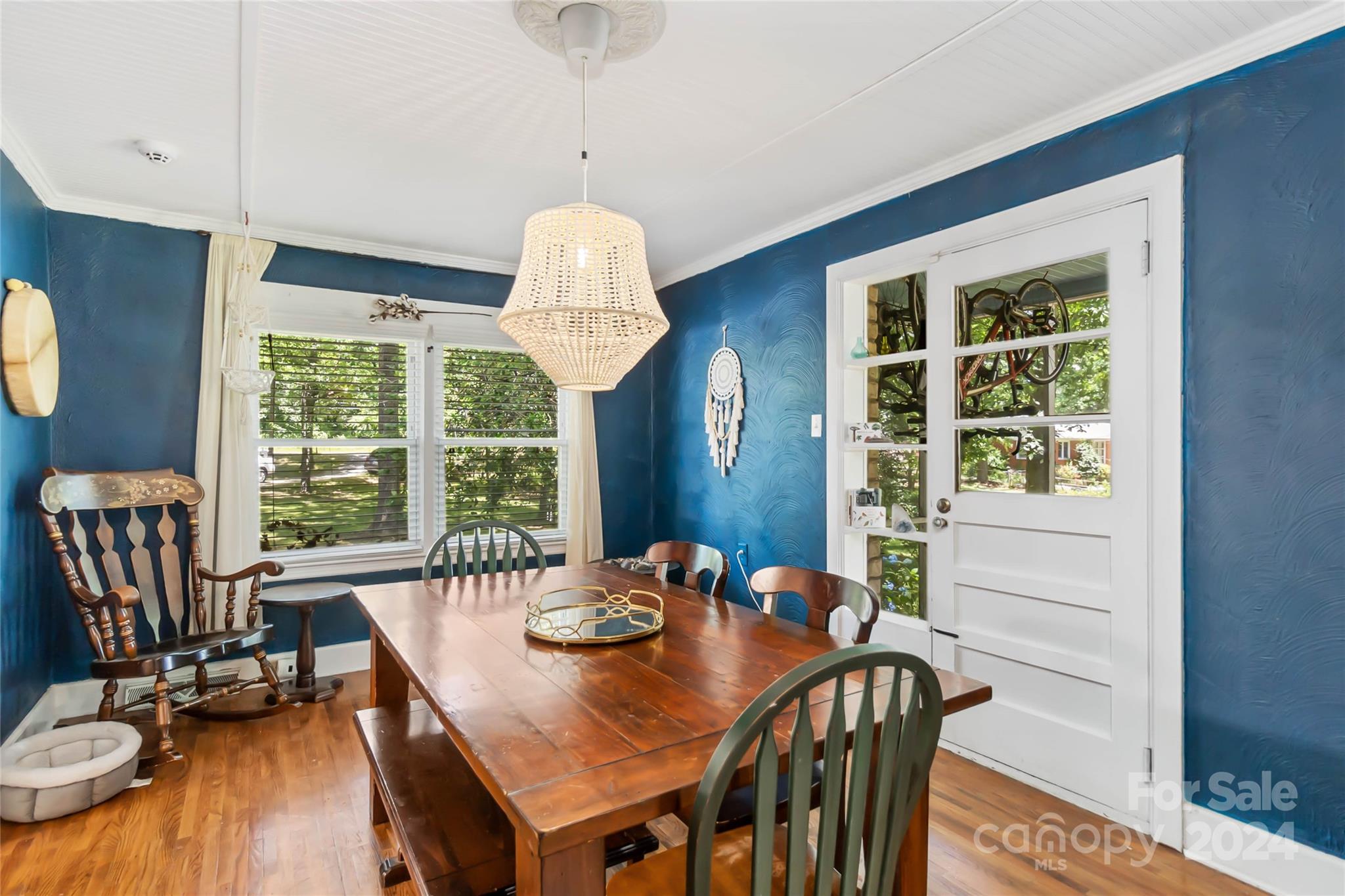 5500 Wilora Lake Road Charlotte, NC 28212 - Photo 7 of 32 a view of a dining room with furniture window and outside view