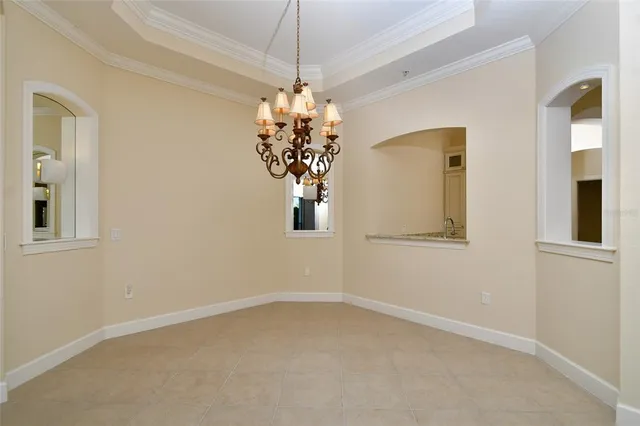 $974,000 | 8051 Players Cove Drive, Unit 202, Naples, FL 34113