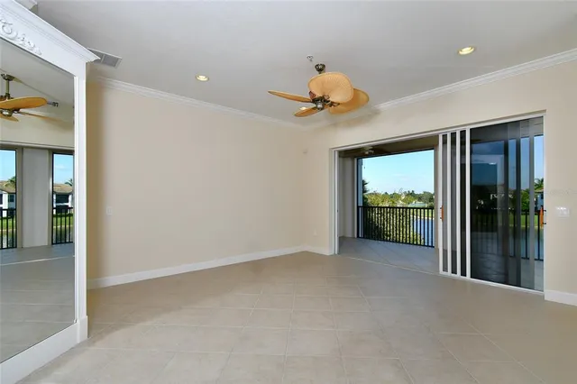 $974,000 | 8051 Players Cove Drive, Unit 202, Naples, FL 34113