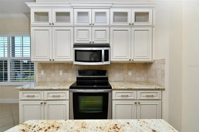 $974,000 | 8051 Players Cove Drive, Unit 202, Naples, FL 34113