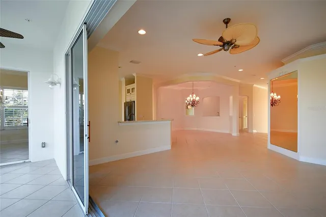 $974,000 | 8051 Players Cove Drive, Unit 202, Naples, FL 34113