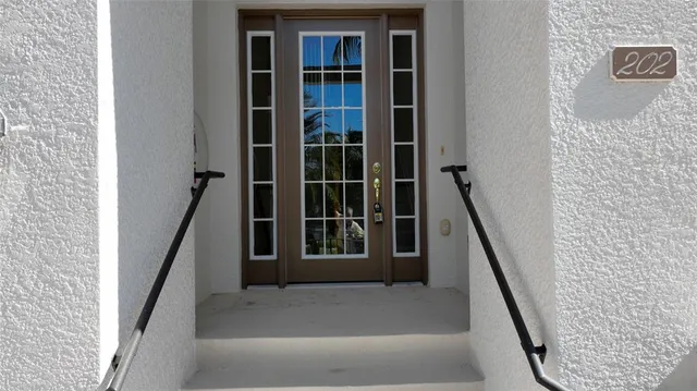 $974,000 | 8051 Players Cove Drive, Unit 202, Naples, FL 34113