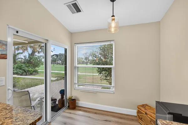 a kitchen with a sink and a window