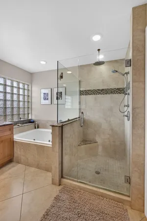 a bathroom with a bathtub and a sink