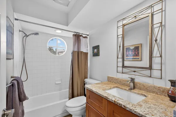 a view of a swimming pool with a yard