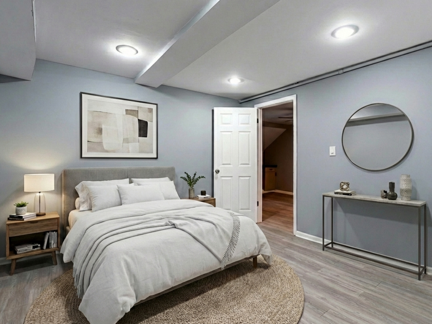 5431 South Indiana Avenue, Unit G Chicago, IL 60615 - Photo 9 of 10 a bedroom with a bed and a chandelier