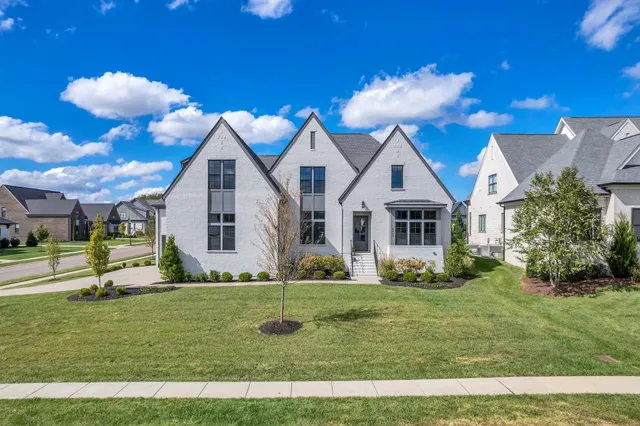 a front view of house with yard