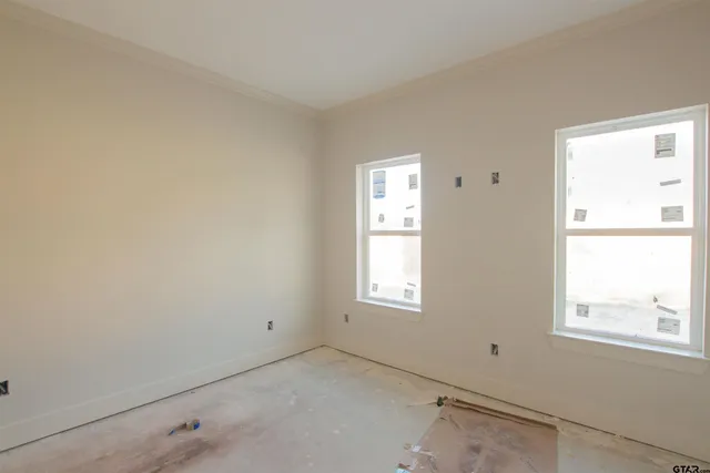 an empty room with windows