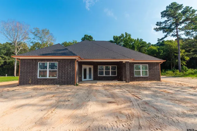 a house view with a outdoor space