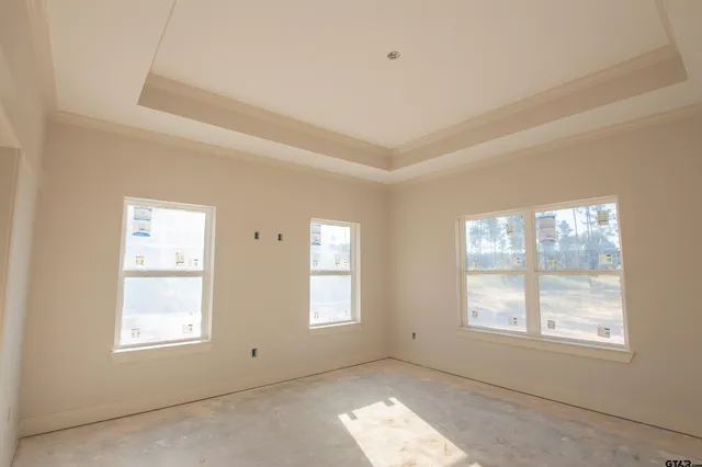 an empty room with windows