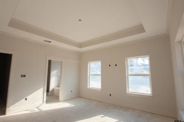 an empty room with windows