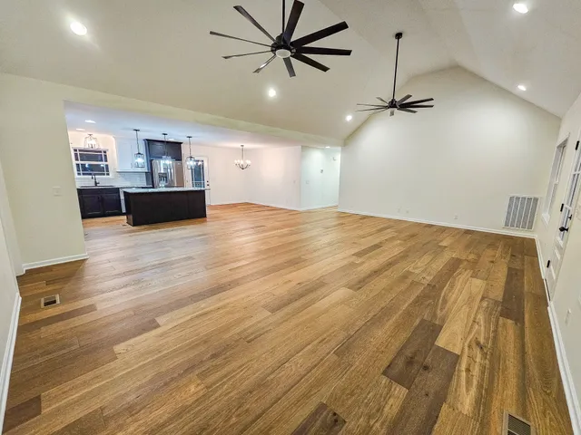 a view of a kitchen with a dishwasher and cabinets